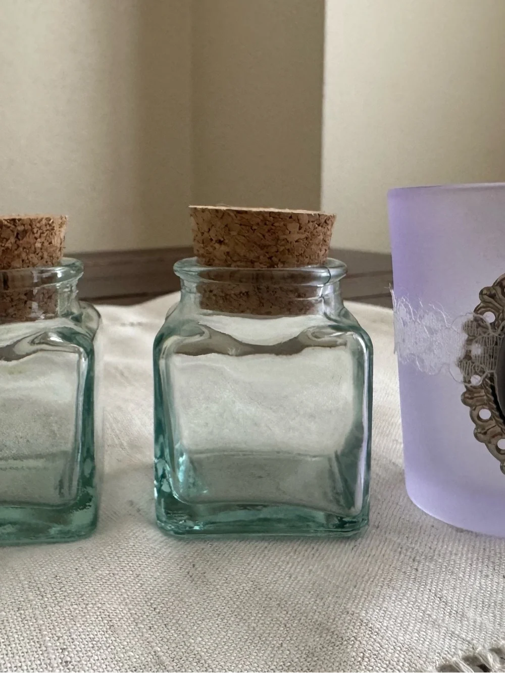 Set of 2 Mini Glasses Jars and 1 Votive Candle Holder.